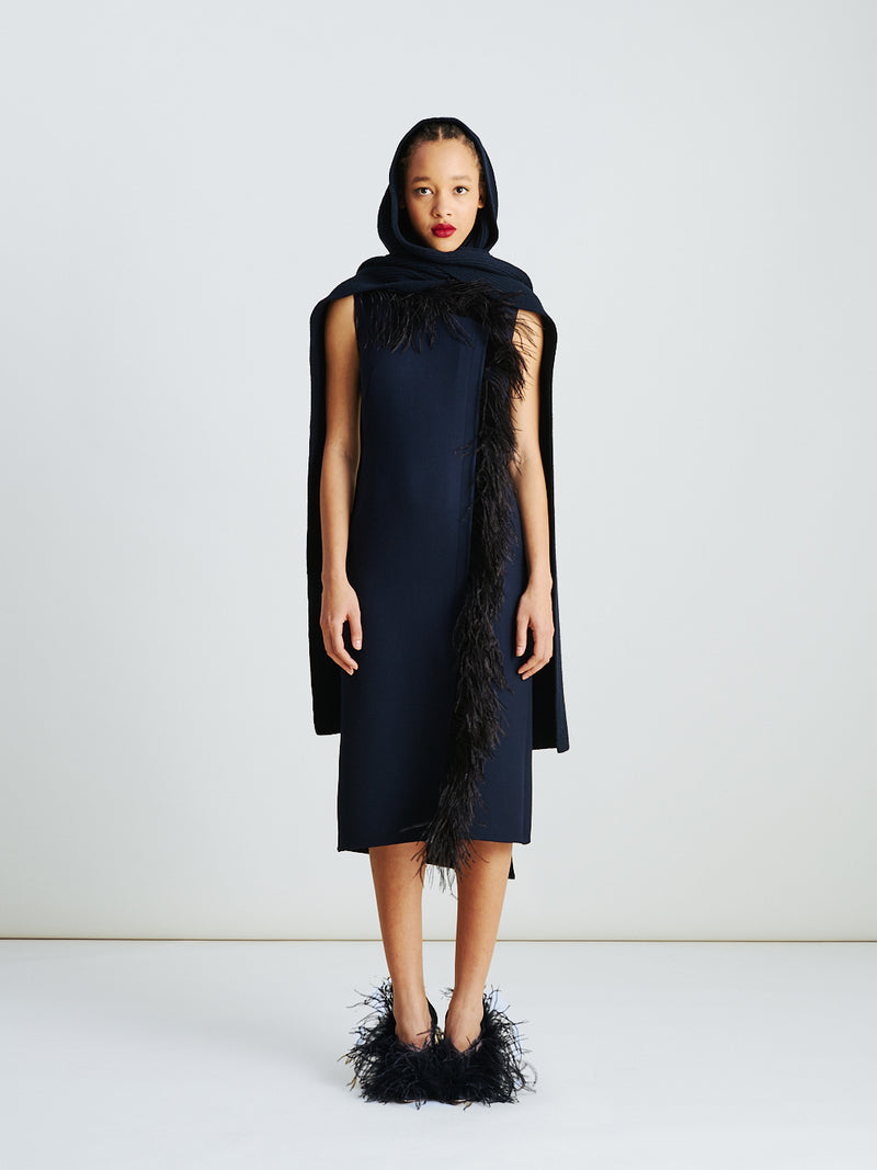 Akris asymmetrical midi dress with feather-trim in navy/black – wool double-face fabric, sleeveless with round neck, trapeze panel and feather detail for modern elegance.