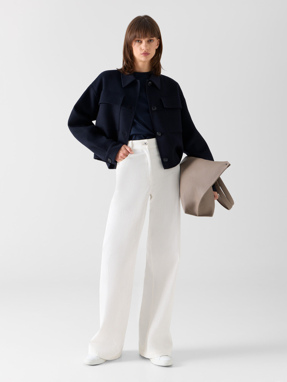 Discover the ultimate wardrobe foundations with the Akris pants collection, meticulously curated based on perfect fit, versatile occasion, and premium material. This image highlights impeccably tailored trousers designed to offer effortless sophistication and comfort for the modern lifestyle. Experience precision Swiss tailoring and enduring luxury.