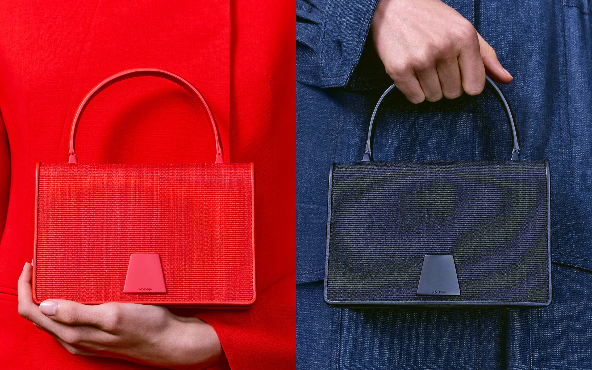 Close-up of two textured handbags with a trapezoidal clasp, one in vibrant red and the other in sleek black.
The bags are held against matching red and dark denim outfits, showcasing their fine woven detail.