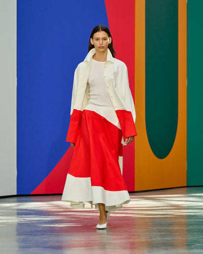 A look from Akris Spring/Summer 2026, blending art and fashion with Swiss luxury design, couture craftsmanship, and timeless elegance inspired by Leon Polk Smith