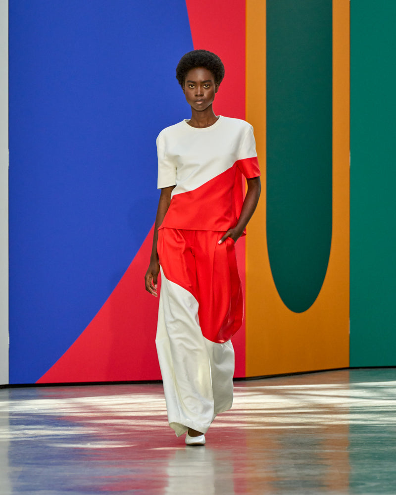 A look from Akris Spring/Summer 2026, blending art and fashion with Swiss luxury design, couture craftsmanship, and timeless elegance inspired by Leon Polk Smith