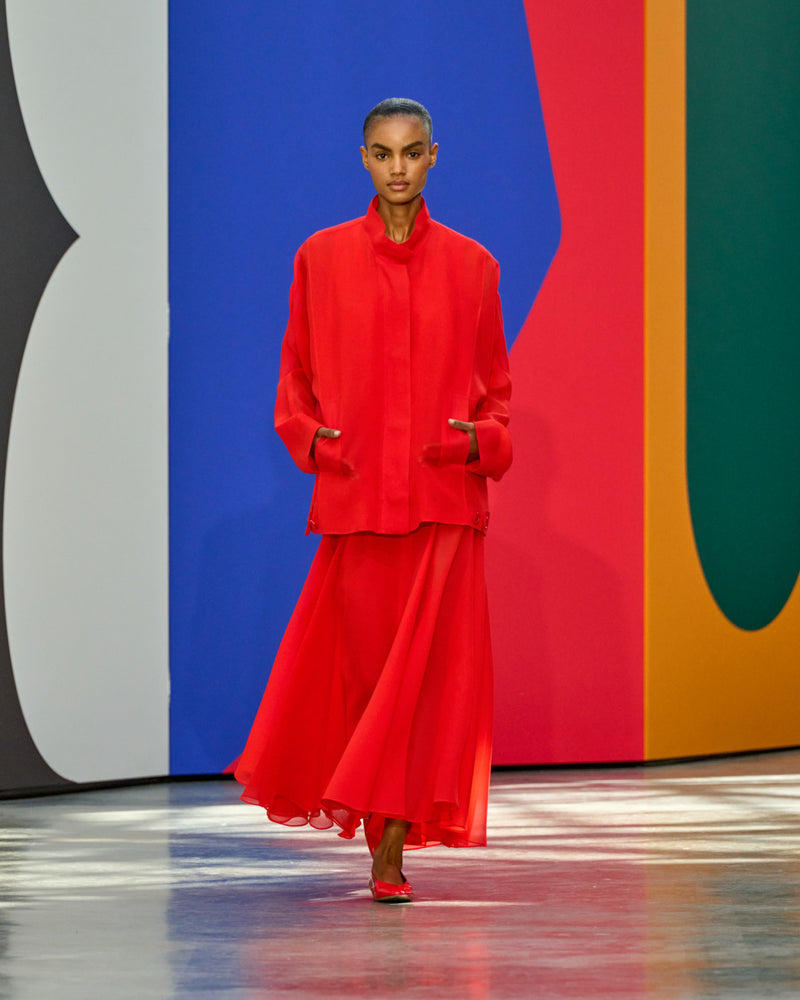 A look from Akris Spring/Summer 2026, blending art and fashion with Swiss luxury design, couture craftsmanship, and timeless elegance inspired by Leon Polk Smith