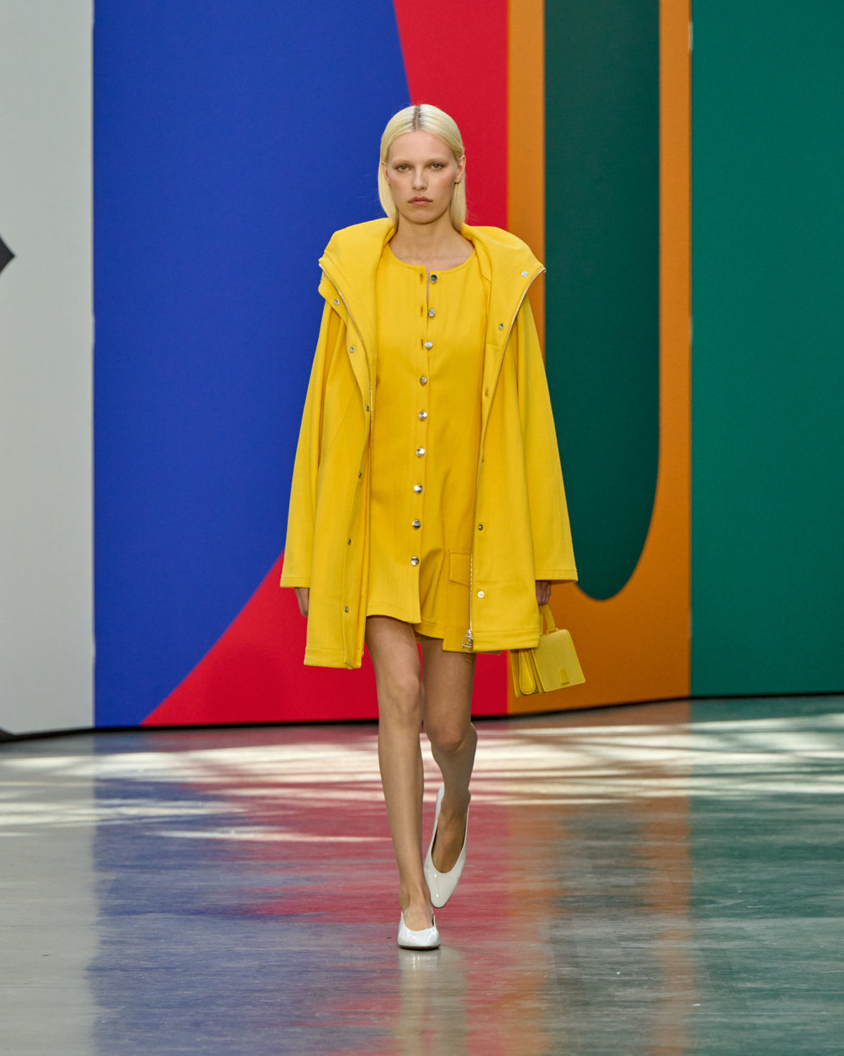 A look from Akris Spring/Summer 2026, blending art and fashion with Swiss luxury design, couture craftsmanship, and timeless elegance inspired by Leon Polk Smith