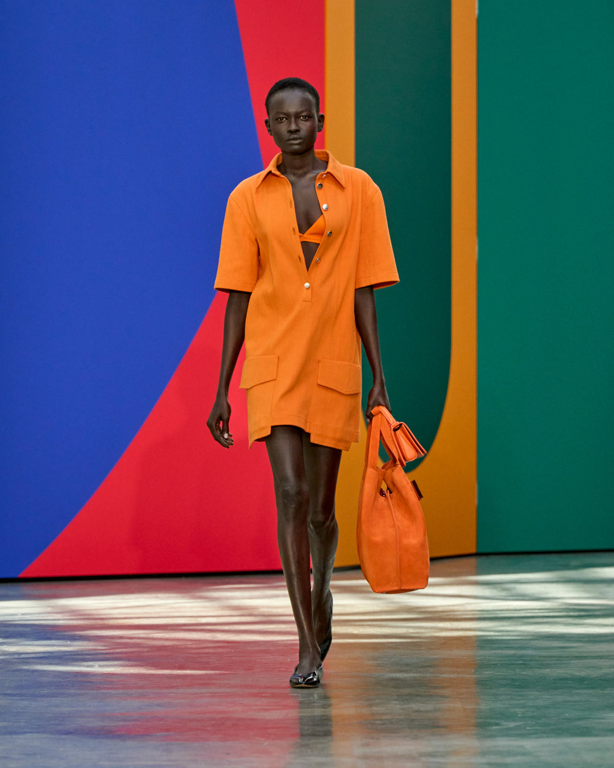 A look from Akris Spring/Summer 2026, blending art and fashion with Swiss luxury design, couture craftsmanship, and timeless elegance inspired by Leon Polk Smith