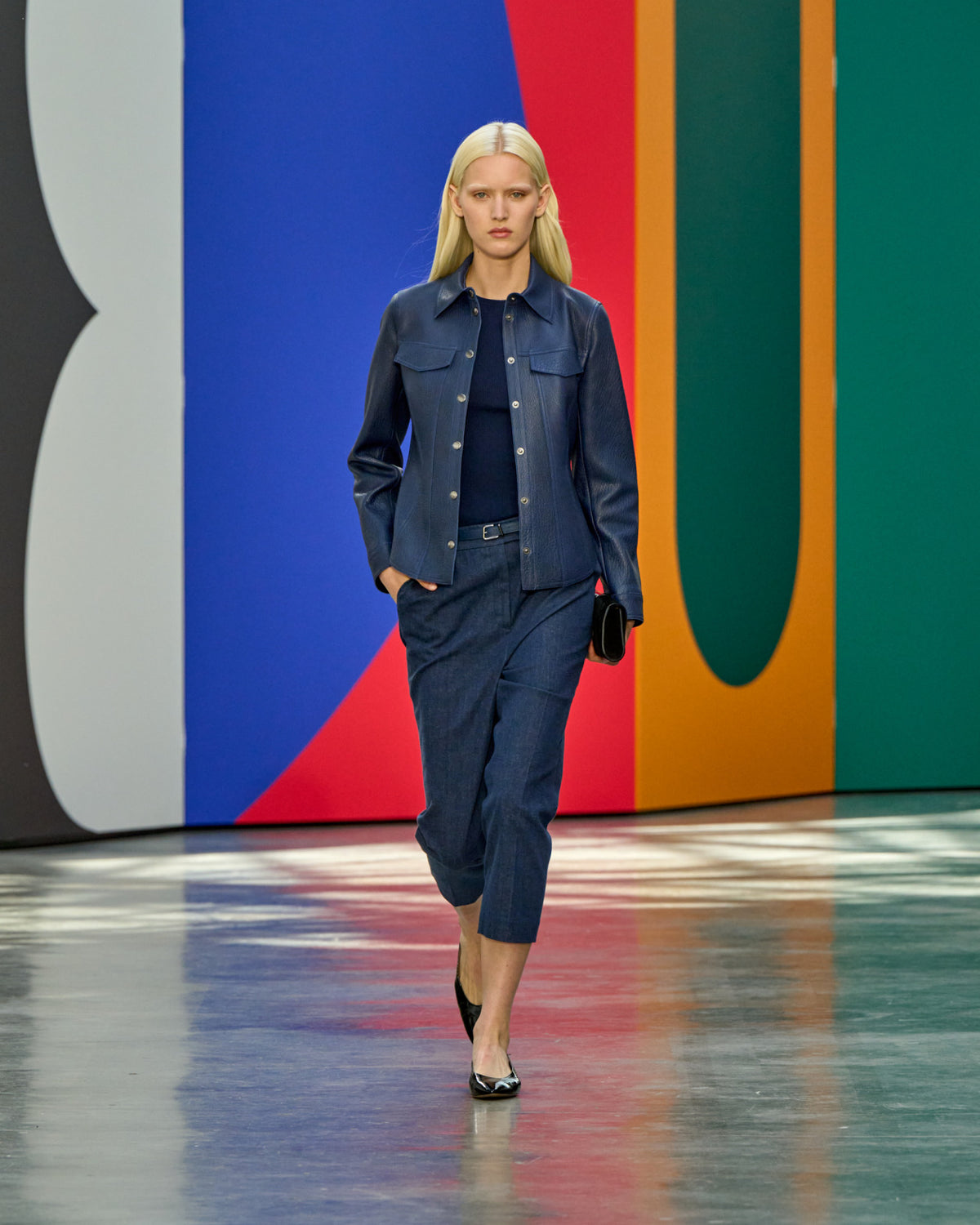 A look from Akris Spring/Summer 2026, blending art and fashion with Swiss luxury design, couture craftsmanship, and timeless elegance inspired by Leon Polk Smith