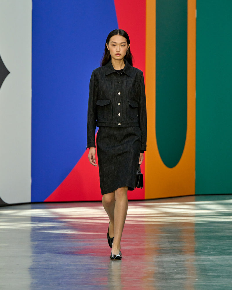 A look from Akris Spring/Summer 2026, blending art and fashion with Swiss luxury design, couture craftsmanship, and timeless elegance inspired by Leon Polk Smith