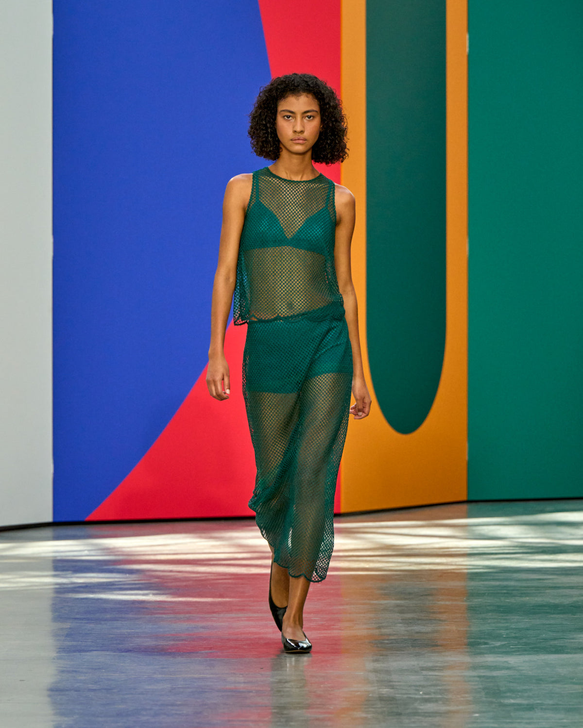 A look from Akris Spring/Summer 2026, blending art and fashion with Swiss luxury design, couture craftsmanship, and timeless elegance inspired by Leon Polk Smith
