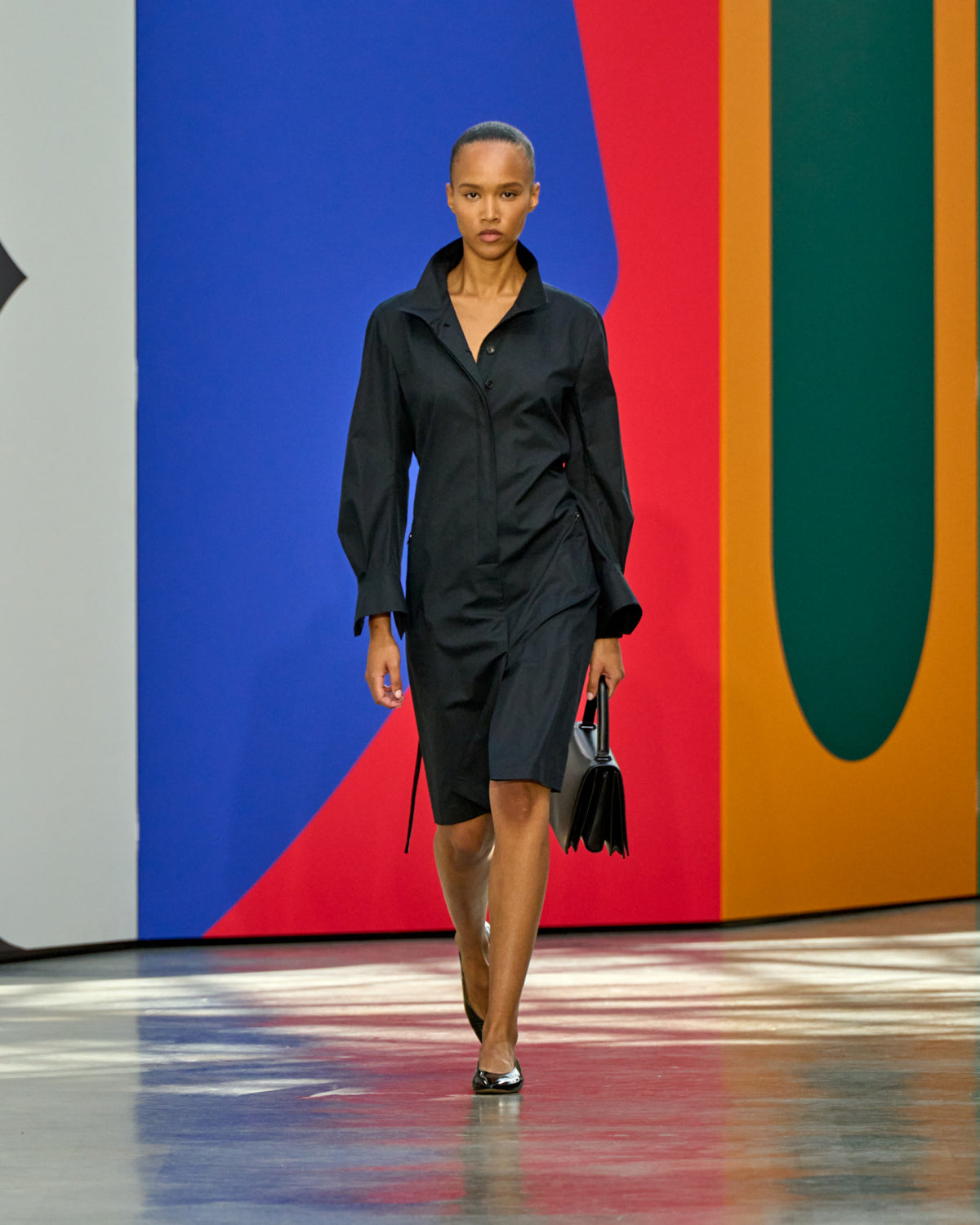 A look from Akris Spring/Summer 2026, blending art and fashion with Swiss luxury design, couture craftsmanship, and timeless elegance inspired by Leon Polk Smith