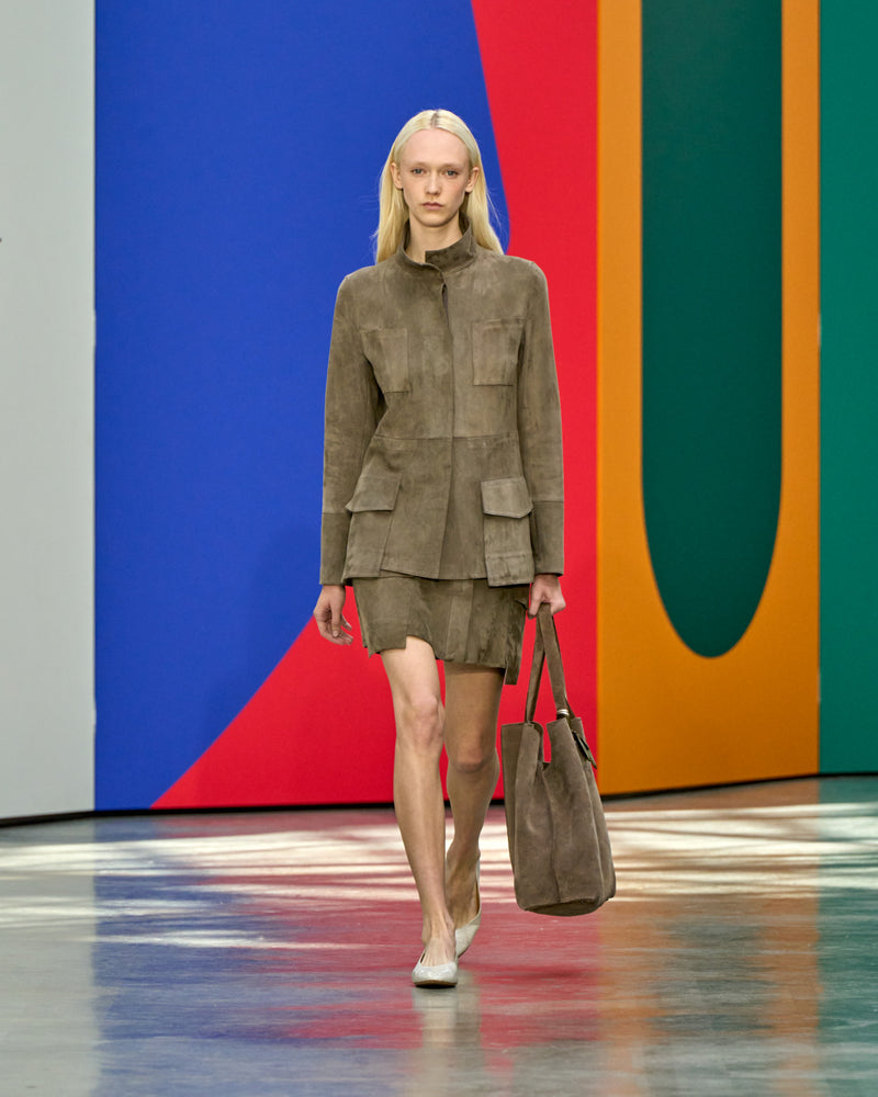 A look from Akris Spring/Summer 2026, blending art and fashion with Swiss luxury design, couture craftsmanship, and timeless elegance inspired by Leon Polk Smith