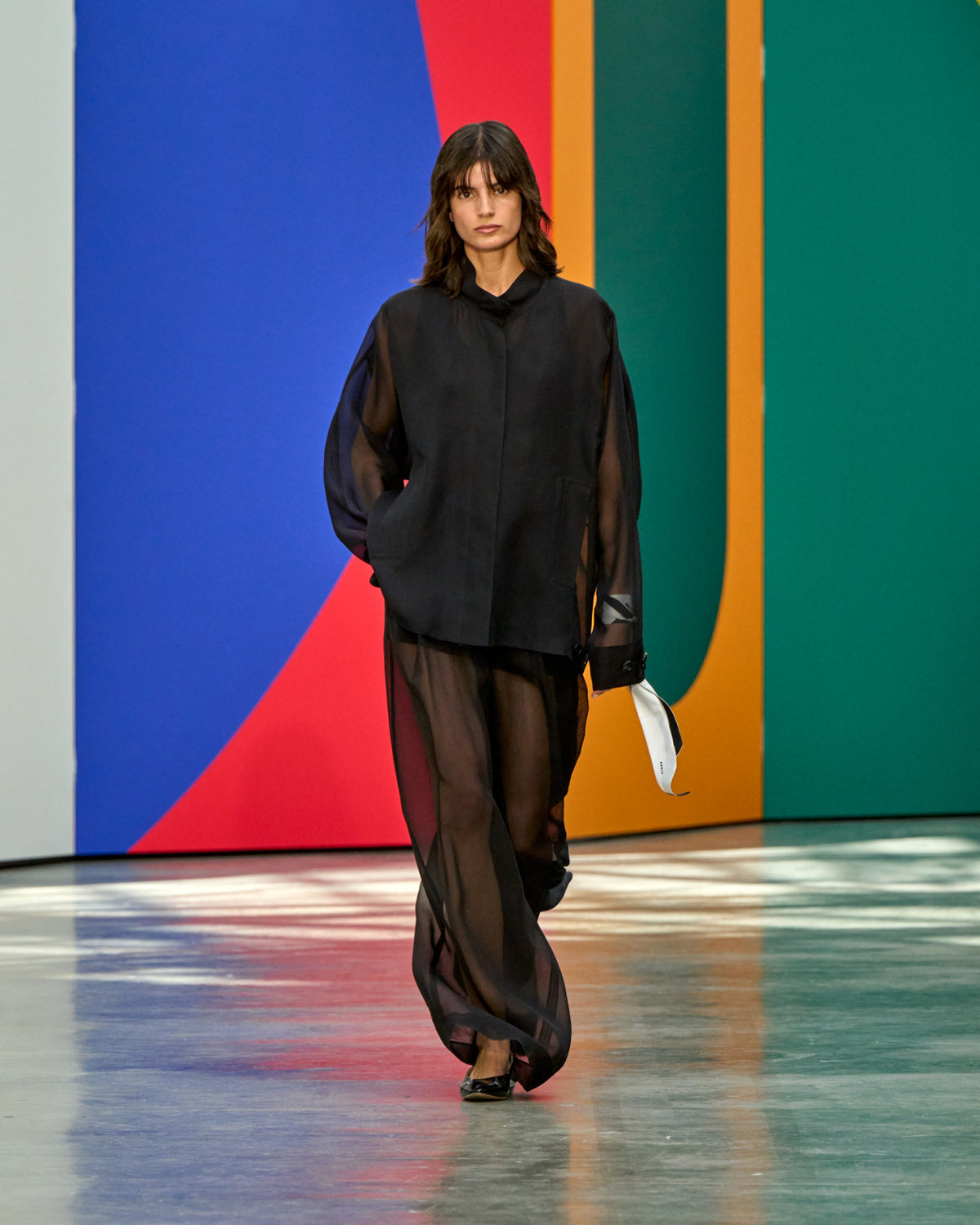 A look from Akris Spring/Summer 2026, blending art and fashion with Swiss luxury design, couture craftsmanship, and timeless elegance inspired by Leon Polk Smith