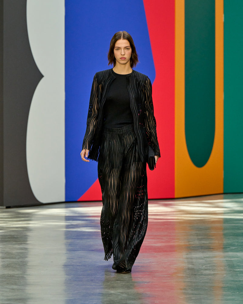 A look from Akris Spring/Summer 2026, blending art and fashion with Swiss luxury design, couture craftsmanship, and timeless elegance inspired by Leon Polk Smith