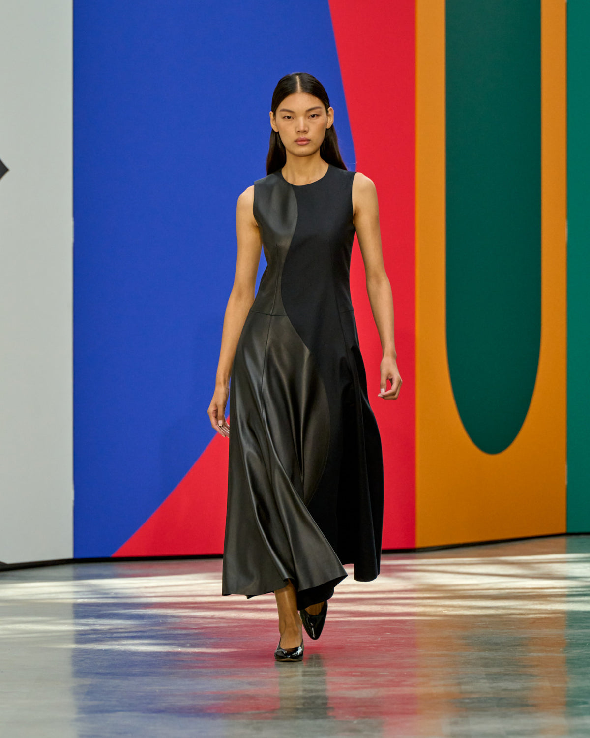 A look from Akris Spring/Summer 2026, blending art and fashion with Swiss luxury design, couture craftsmanship, and timeless elegance inspired by Leon Polk Smith