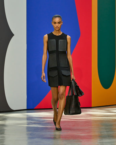 A look from Akris Spring/Summer 2026, blending art and fashion with Swiss luxury design, couture craftsmanship, and timeless elegance inspired by Leon Polk Smith