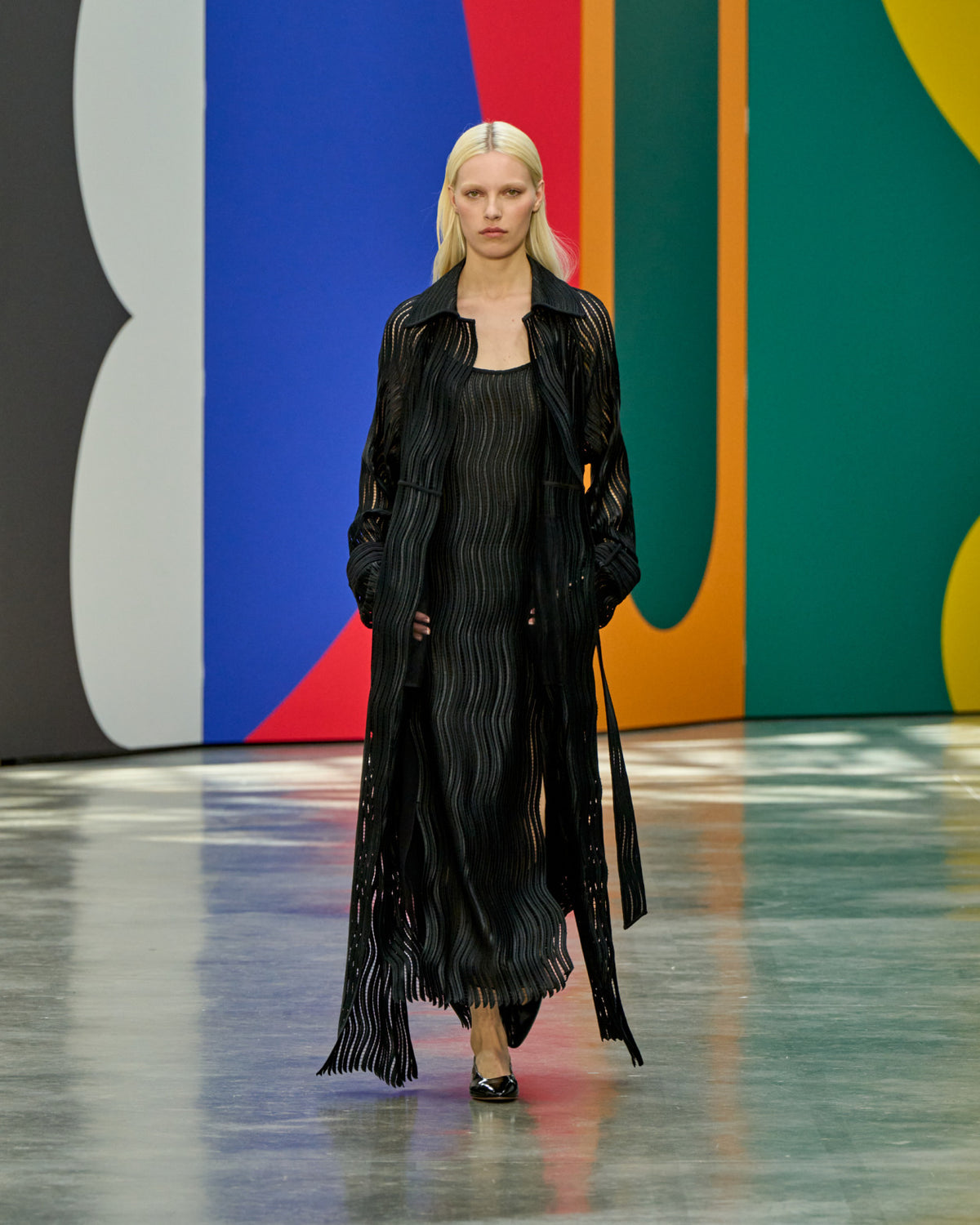 A look from Akris Spring/Summer 2026, blending art and fashion with Swiss luxury design, couture craftsmanship, and timeless elegance inspired by Leon Polk Smith