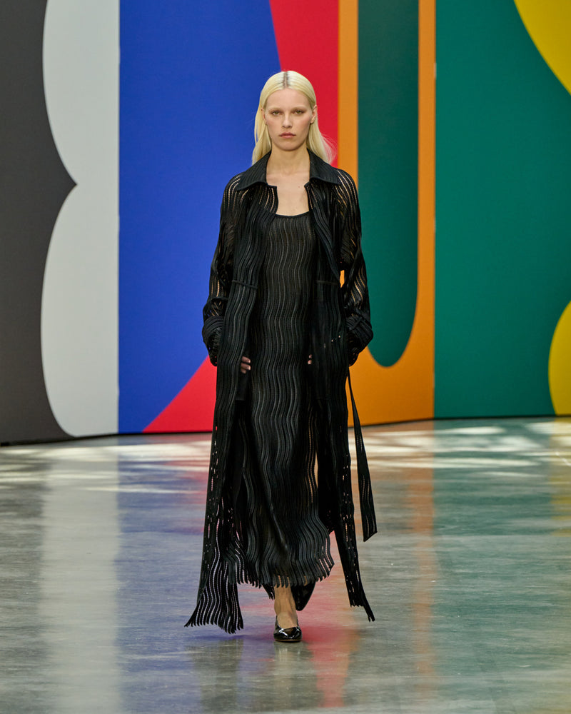 A look from Akris Spring/Summer 2026, blending art and fashion with Swiss luxury design, couture craftsmanship, and timeless elegance inspired by Leon Polk Smith