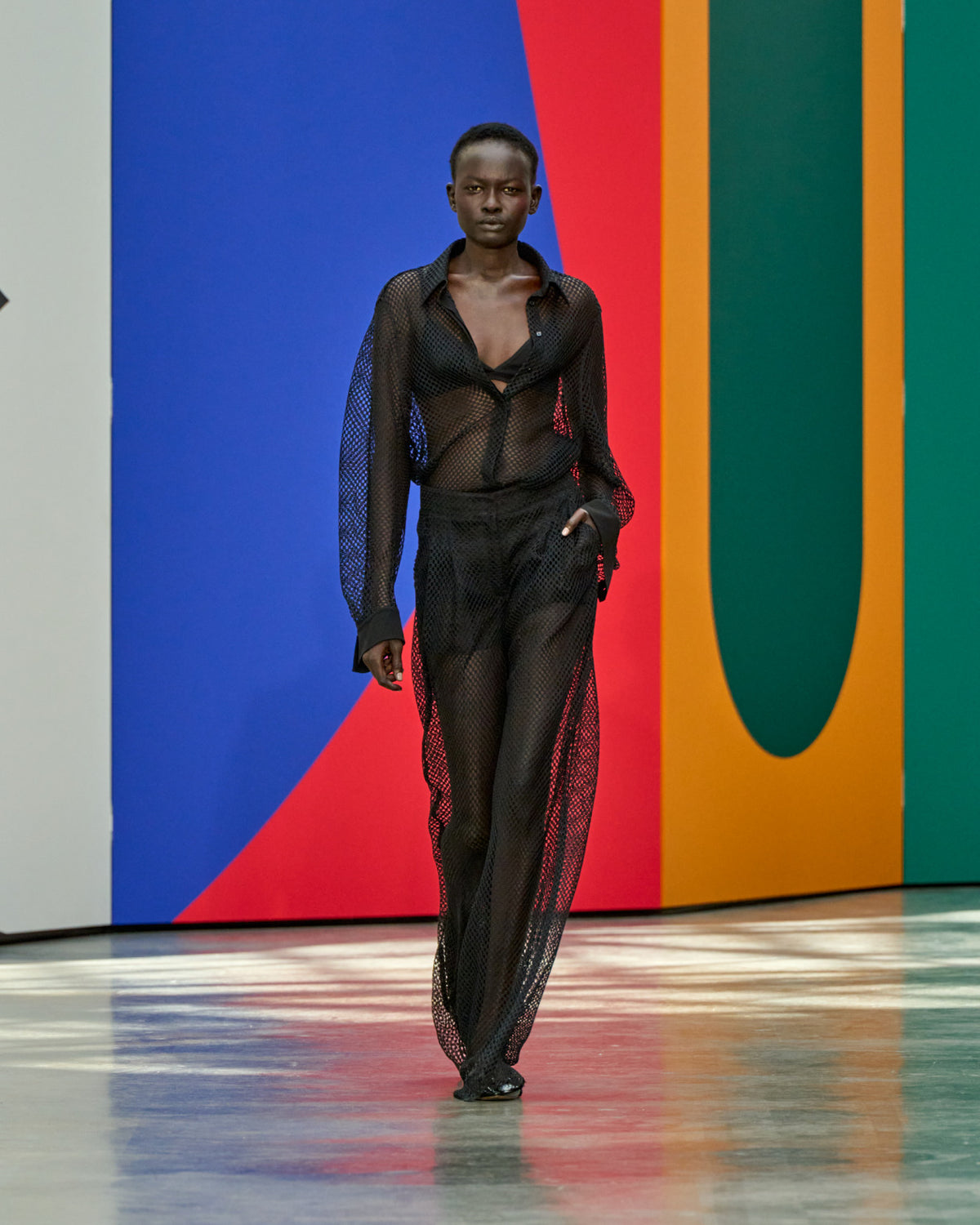 A look from Akris Spring/Summer 2026, blending art and fashion with Swiss luxury design, couture craftsmanship, and timeless elegance inspired by Leon Polk Smith