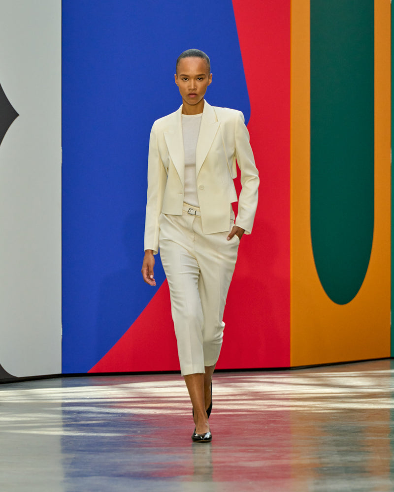A look from Akris Spring/Summer 2026, blending art and fashion with Swiss luxury design, couture craftsmanship, and timeless elegance inspired by Leon Polk Smith