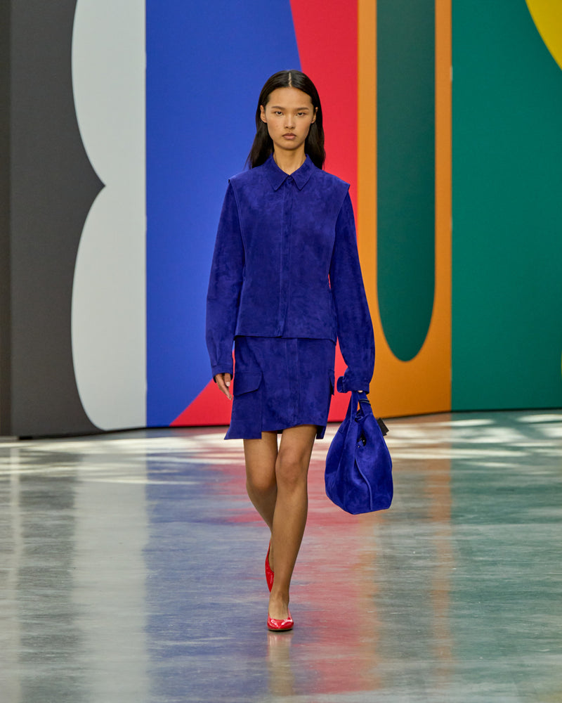 A look from Akris Spring/Summer 2026, blending art and fashion with Swiss luxury design, couture craftsmanship, and timeless elegance inspired by Leon Polk Smith