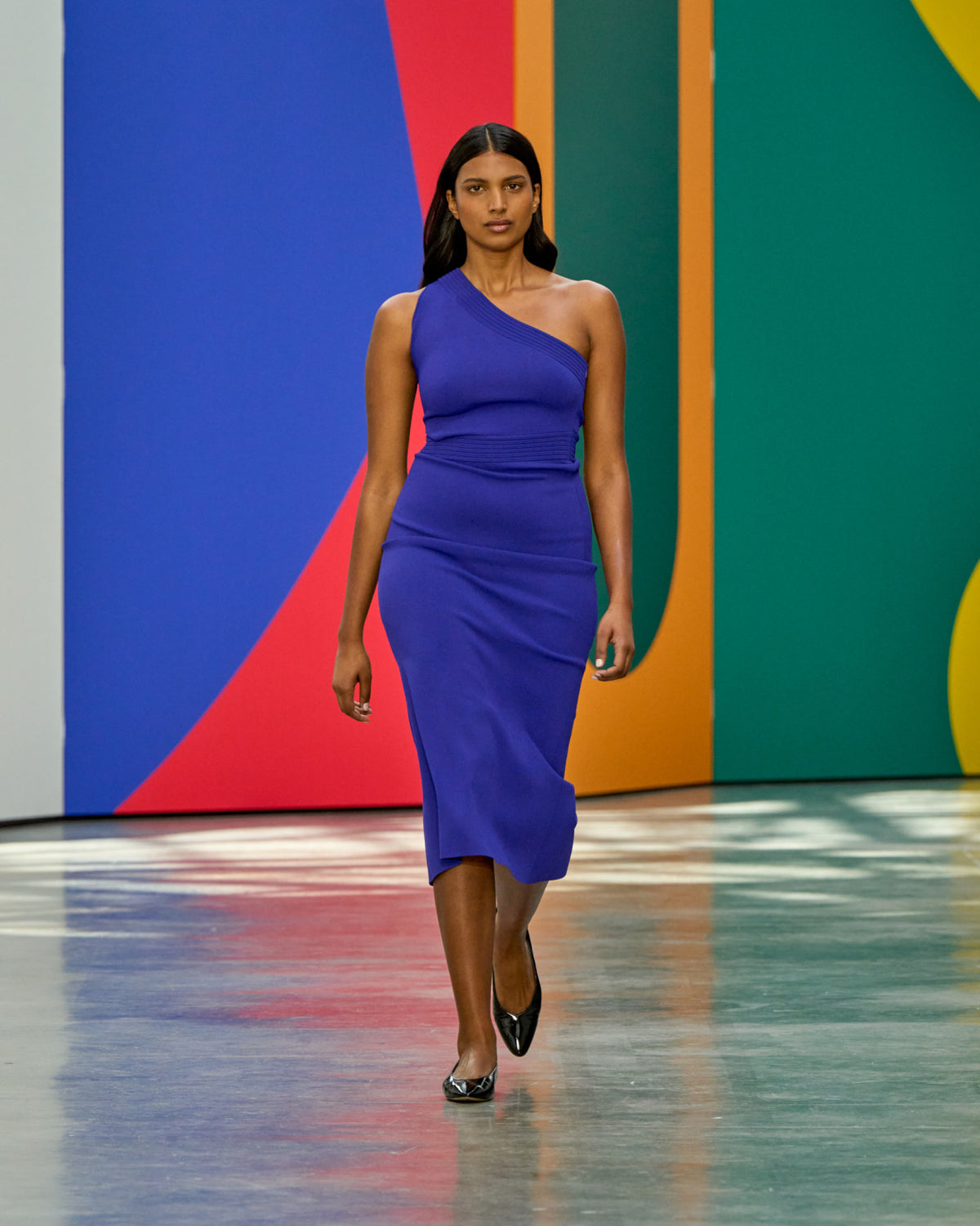 A look from Akris Spring/Summer 2026, blending art and fashion with Swiss luxury design, couture craftsmanship, and timeless elegance inspired by Leon Polk Smith