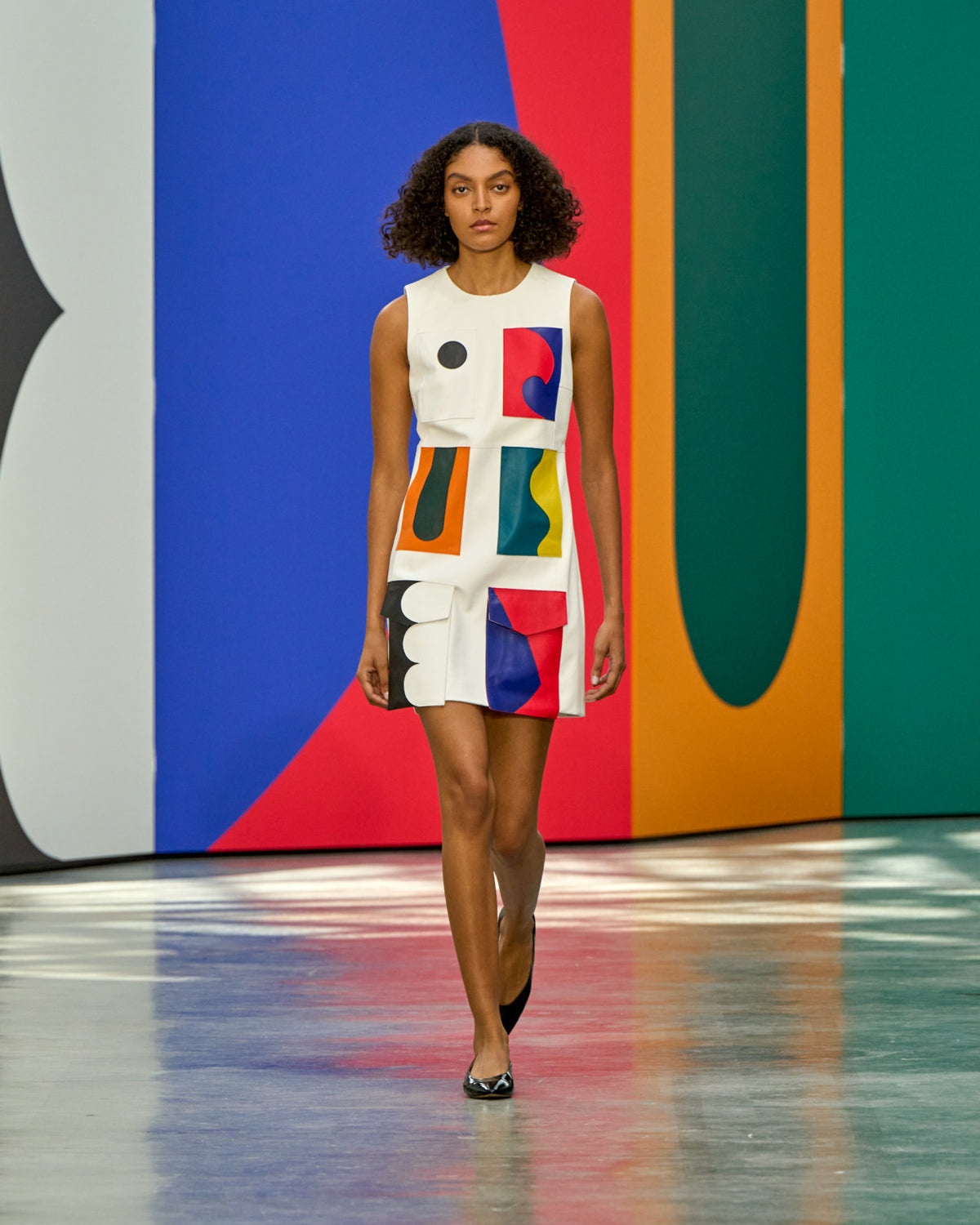 A look from Akris Spring/Summer 2026, blending art and fashion with Swiss luxury design, couture craftsmanship, and timeless elegance inspired by Leon Polk Smith