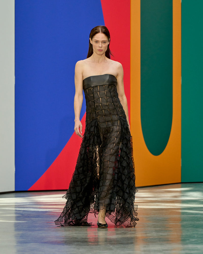 A look from Akris Spring/Summer 2026, blending art and fashion with Swiss luxury design, couture craftsmanship, and timeless elegance inspired by Leon Polk Smith