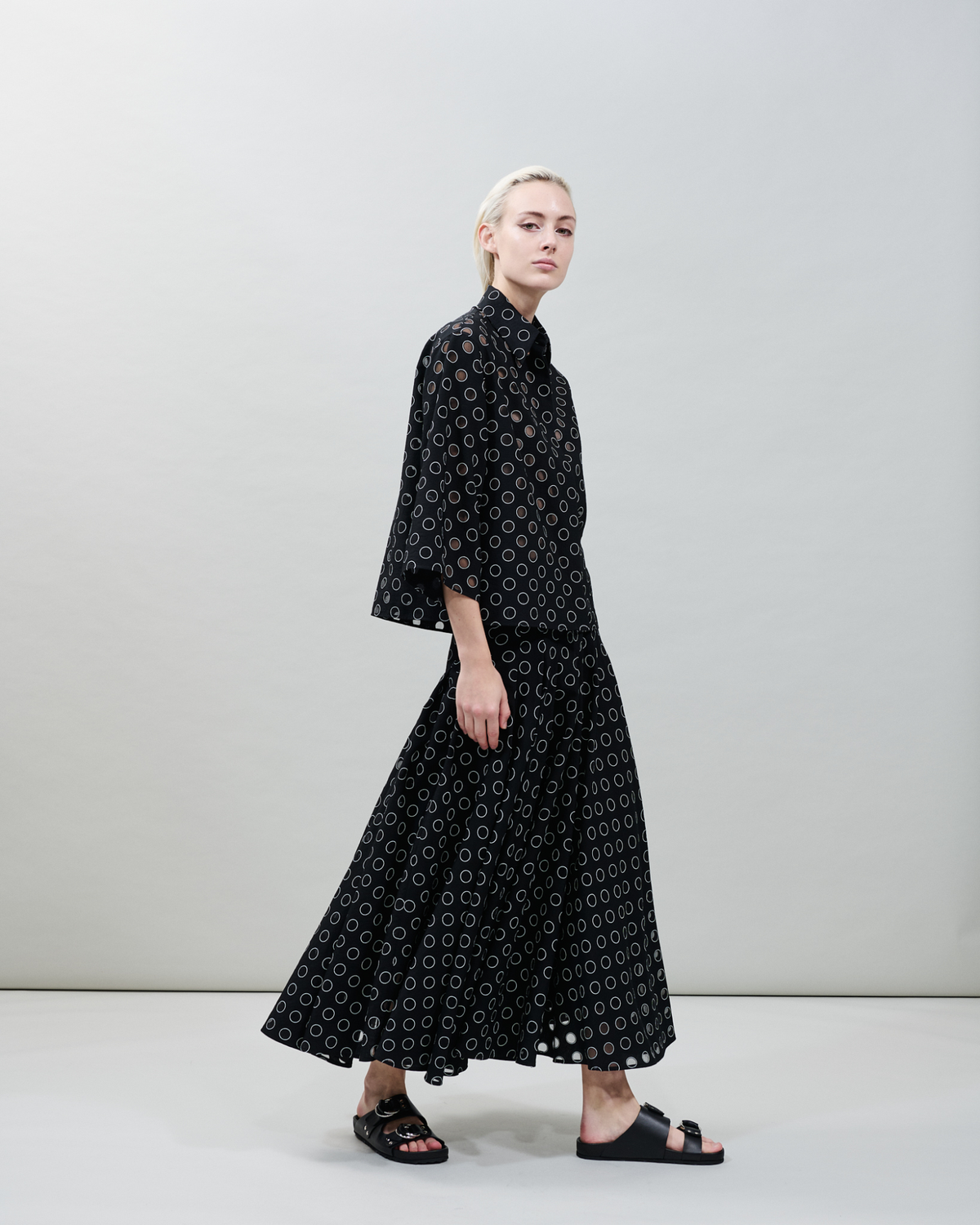 Designer Pleated Midi Skirt in Polka Dot Organzino - black - neutral #editorial