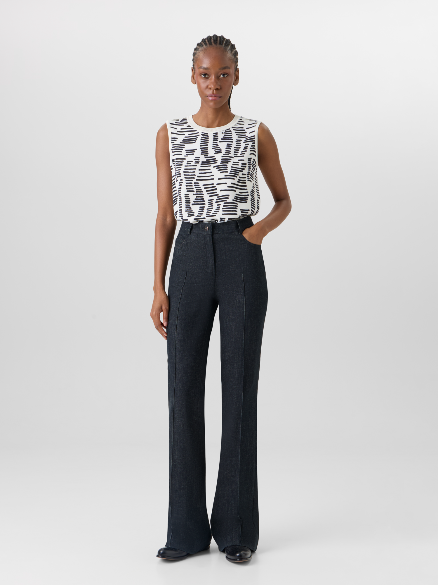 Designer Sleeveless Dance Movement Knit Top - ecru 