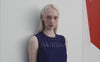 Embrace the romantic artistry of the Akris Spring collection, showcasing a breathtaking sleeveless dress adorned with intricate, delicate embroidery. Perfectly complementing the clean-lined aesthetic, this look beautifully captures light, fluid movement and modern feminine elegance. Experience timeless luxury and masterful Swiss craftsmanship.